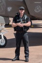 Armed police officer guarding F-35 Lightning 2 aircraft