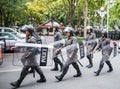 Armed policemen patrol