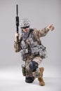 Armed Soldier pointing with finger Royalty Free Stock Photo