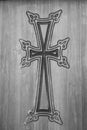 Armenia, Amberd, September 2022. Traditional Armenian cross on a wooden door.