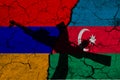 Armenia and Azerbaycan flag on Textured Cracked Earth. Silhouette of a hand holding a machine gun. 3d rendering