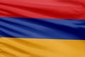 Armenia flag is depicted on a sport stitch cloth fabric with folds