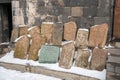 Armenia, Lake Sevan - January 9, 2026: Row of carved Armenian khachkars (cross-stones) stands against the Royalty Free Stock Photo