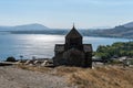 Armenia, Lake Sevan, September 2021. Christian temple and monastery ruins overlooking the lake.