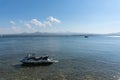 Armenia, Lake Sevan, September 2021. Jet ski on the lake, mountains and sky.