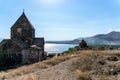Armenia, Lake Sevan, September 2021. Medieval monastery complex among mountains and clouds. Royalty Free Stock Photo