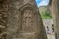 Armenia,monastery Geghard - 2017,June 12.Armenian cross stone khachkar in the wall of ancient monastery. Royalty Free Stock Photo