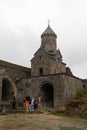 Armenia, Tatev, September 2022. Tourists at the church of St. Minas in the monastery.