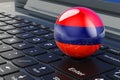 Armenian flag on laptop keyboard. Online business, education, shopping in Armenia concept. 3D rendering