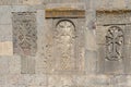 Armenian stone cross called khachkar are built into the walls of the Tatev Monastery. Armenia Royalty Free Stock Photo