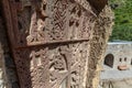 Armenian stone wall to which are carved khachkars