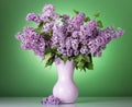 Armful of lilac stands in vase on green background