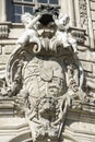 Armorial with putti and crown on Facade of Palace