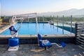 Armory Hotel rooftop pool with disabled access crane chair Royalty Free Stock Photo