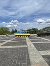 The armoured vehicles painted in national official colours of Ukraine with playing children, Kyiv, Ukraine Royalty Free Stock Photo