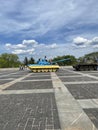 The armoured vehicles painted in national official colours of Ukraine with playing children, Kyiv, Ukraine Royalty Free Stock Photo