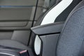 Armrest in the luxury passenger car between the front seats Royalty Free Stock Photo