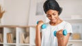 Arms exercises fitness slim woman home dumbbells Royalty Free Stock Photo