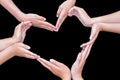 Arms and hands of girls making heart shape Royalty Free Stock Photo