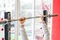 Arms of man working out in the gym, beginner athlete doing bench press exercise Royalty Free Stock Photo