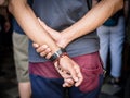 A person holding a bracelet at the religious Mass of Santo Antonio de Categero in church Royalty Free Stock Photo