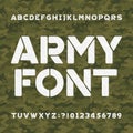 Army alphabet font. Scratched type letters and numbers on a seamless green camo background. Royalty Free Stock Photo