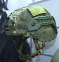 Army anti vibration military helmet presented on stand