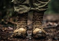 Army boots close up in the mud Royalty Free Stock Photo