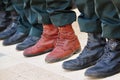 Army Boots Stand Out in a Crowd Royalty Free Stock Photo