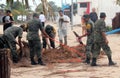 Army cleanup crew in Mahahual Hurricane Ernesto