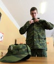 Army conscripts receiving military uniform