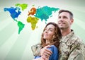 Army couple in front of Colorful Map Royalty Free Stock Photo