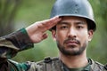 Army, man and salute portrait in military of a veteran with security, protection and battle. Male person, soldier and Royalty Free Stock Photo