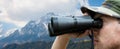 Close up of soldier face looking to binocular