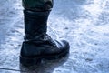 Army / Navy military boot with jungle camouflage pants in top boot