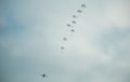 Army paratroopers jumping at air war action