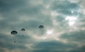 Army paratroopers jumping at air war action