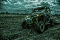 Army rangers moving on military buggy at night Royalty Free Stock Photo