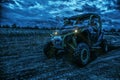 Army rangers moving on military buggy at night