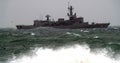 Army ship trough the rough sea Royalty Free Stock Photo