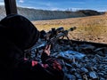 Army sniper looking through the scope. Snipers images. The sniper lies and aims through the telescopic sight. Sniper Rifle with ma