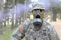 Army soldier wearing gas mask in nature Royalty Free Stock Photo