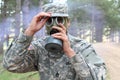 Army soldier wearing gas mask in nature Royalty Free Stock Photo