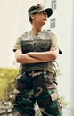 Army, thinking and arms crossed with a confident woman in uniform for safety, service or patriotism Military, idea and a Royalty Free Stock Photo