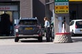 Woman refuels her car in Arnhem, Netherlands Royalty Free Stock Photo