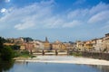 The Arno river and the cloudy Florence. Rainy weather with dark blue clouds hanging over the Italian city - Florence Royalty Free Stock Photo