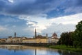 The Arno river and the cloudy Florence. View of the Cathedral of Santa Maria del Fiore, the Basilica of Santa Croce.