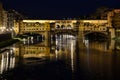 Arno river with Ponte Vecchio in Florence by night