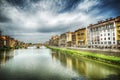 Arno river under a dramatic sky in Florence Royalty Free Stock Photo