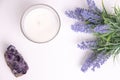 Aroma candle in glass with lavender flowers and amethyst Royalty Free Stock Photo